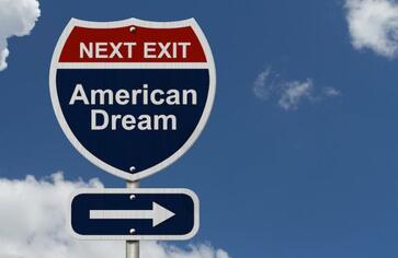 Picture of an exit sign that reads next exit, american dream