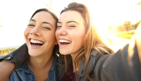 two people smiling 