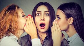 three women gossiping