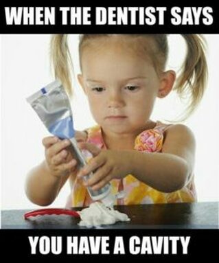 Dental Meme - little girl putting tons of toothpaste on a toothbrush, because she has a cavity.