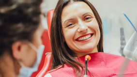 Female dental patient smiling