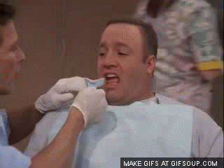 Picture of King of Queens gagging at dentist.